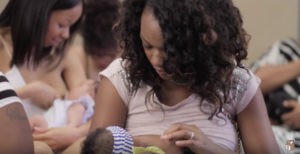 Still from the Chocolate Milk documentary portraying an African American mother nursing her baby