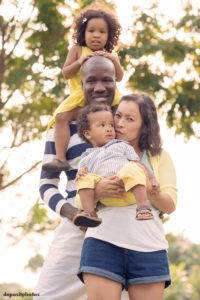 Mother, father, son and daughter outdoors