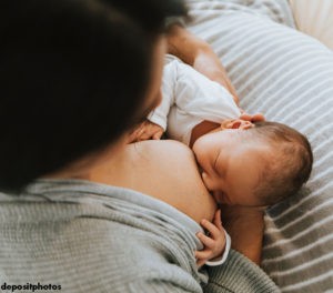 Mother nursing, view from above