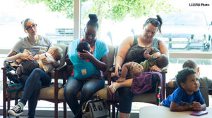 Three mothers at a LLL meeting 2 are breastfeeding