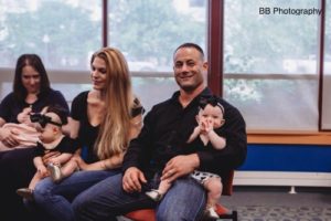 Father holding his baby at an LLL meeting