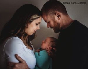 Parents holding their baby