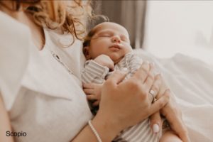 Mother holding her baby 