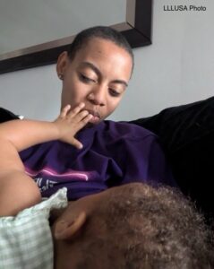 Ta-Sha nursing her baby